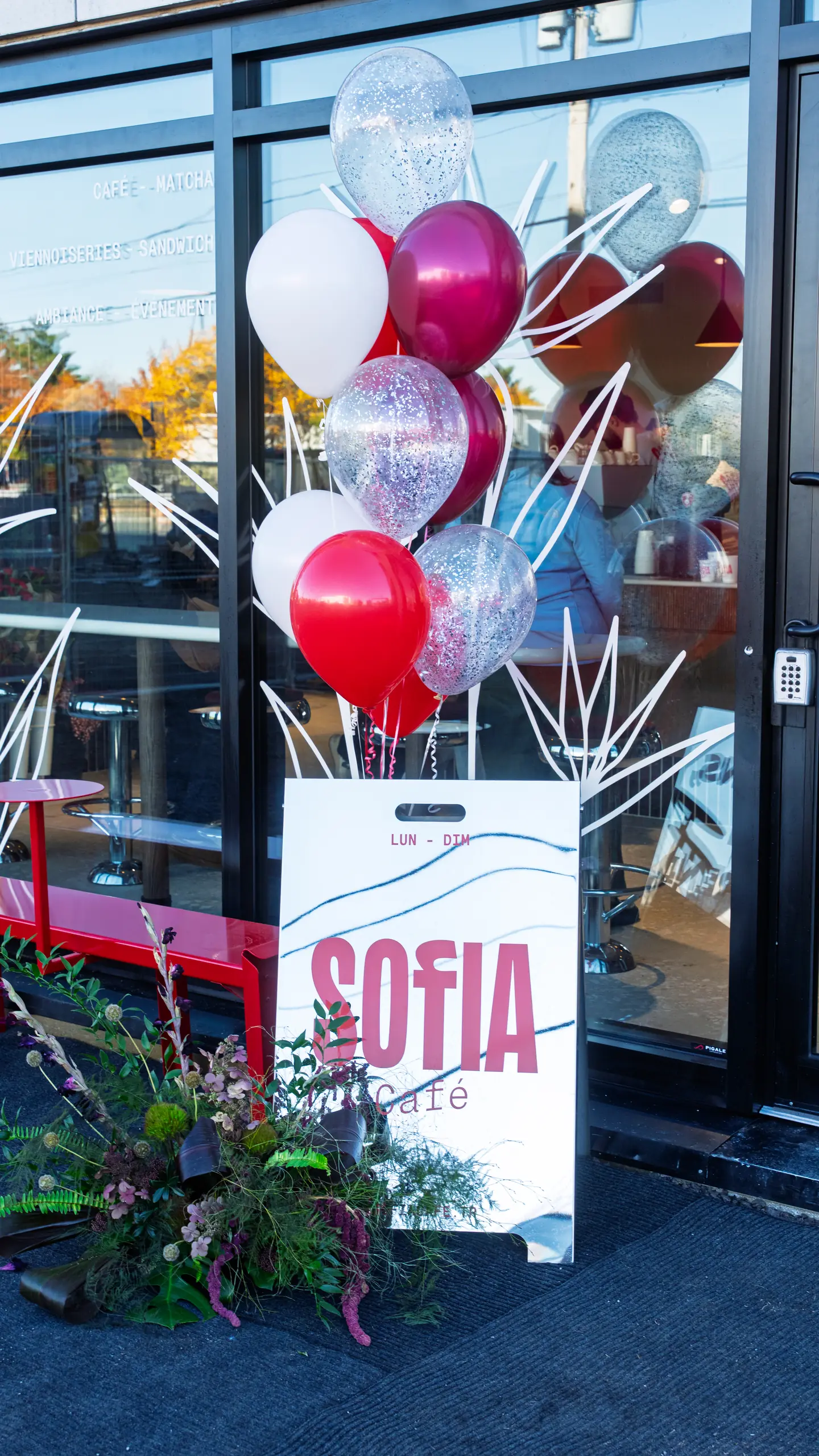 The entrance decorated with balloons for opening day