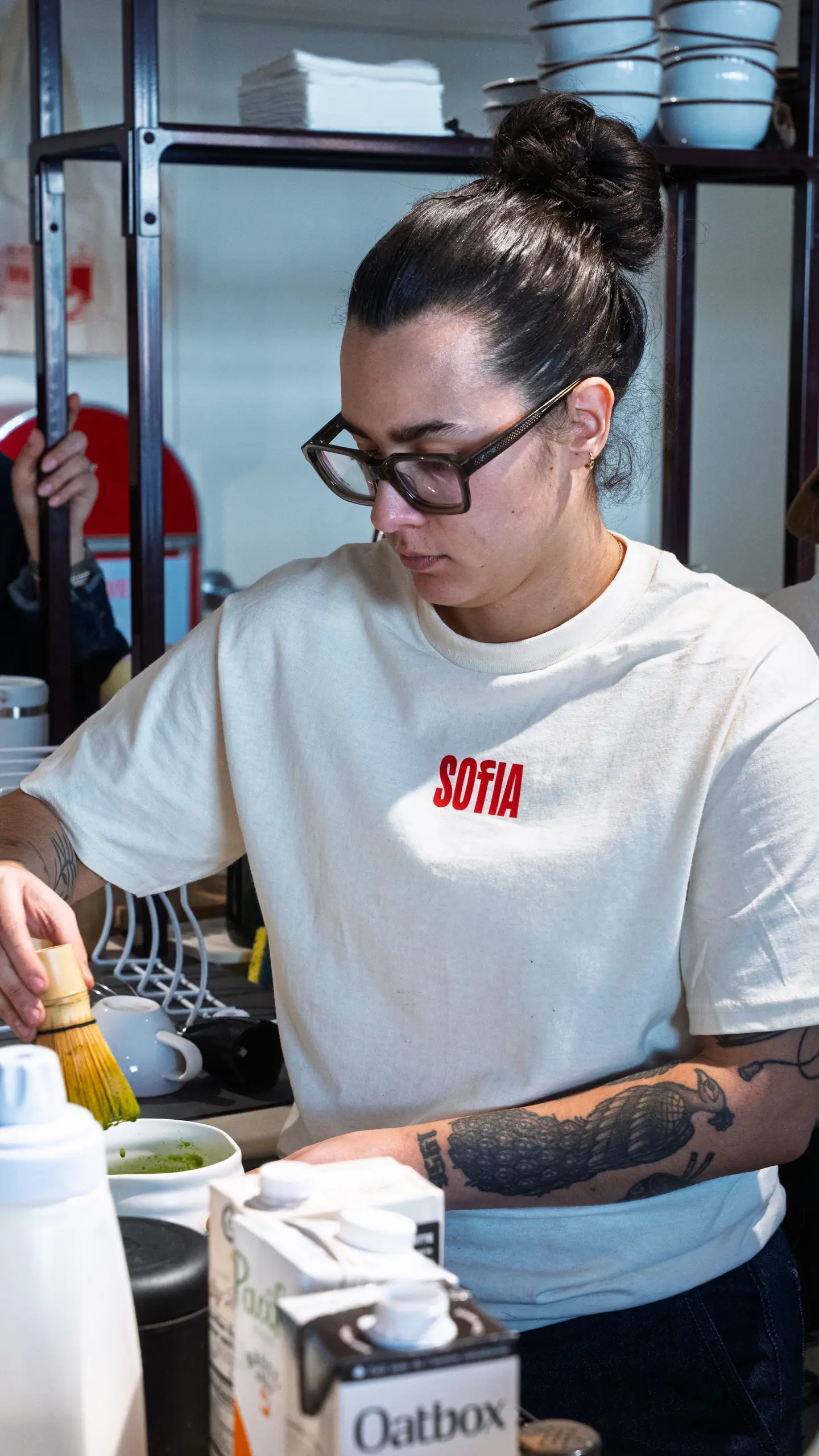 A barista preparing a matcha